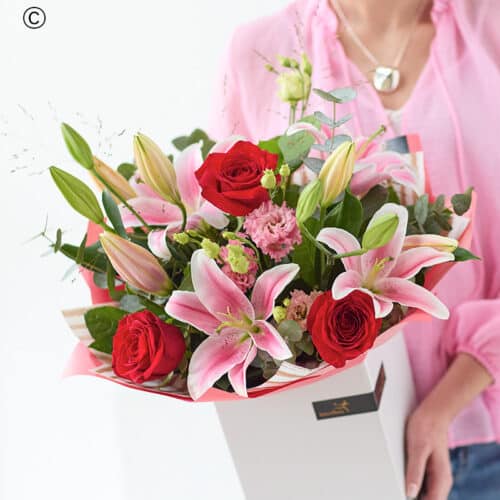 Valentines rose and lily bouquet with red roses and pink lilies