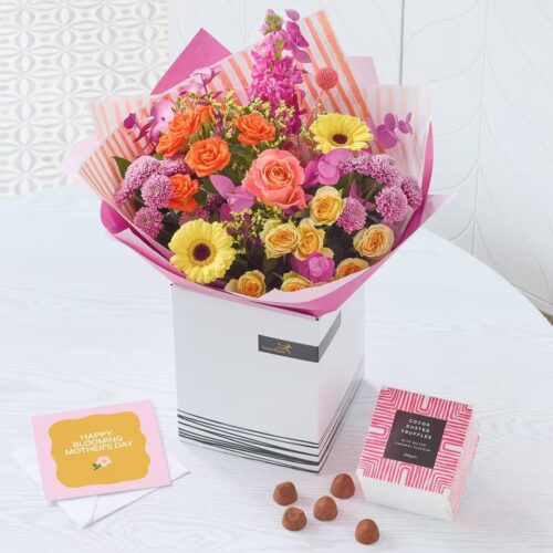 Vibrant spring flowers with chocolates for Mother’s Day, delivered by hand