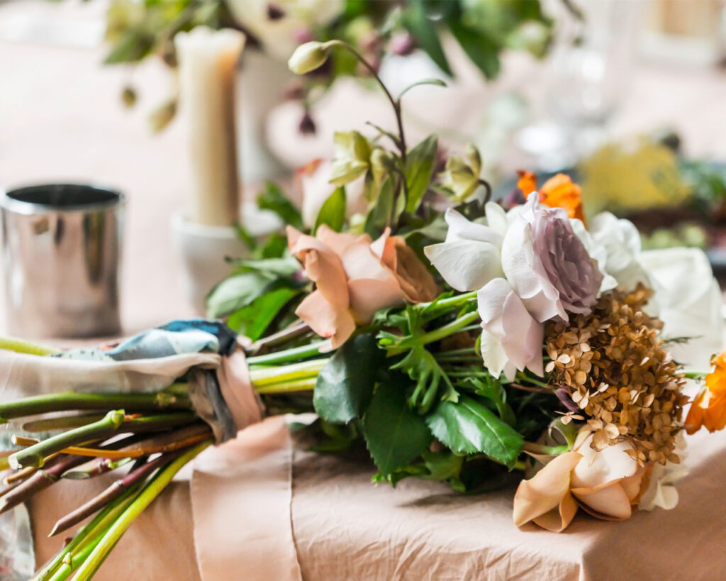 Close Up Place Setting With A Small Posy Of Spring Flowers