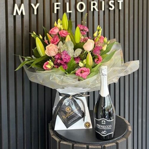 Rose and lily bouquet with Prosecco Rose and lily bouquet with Prosecco