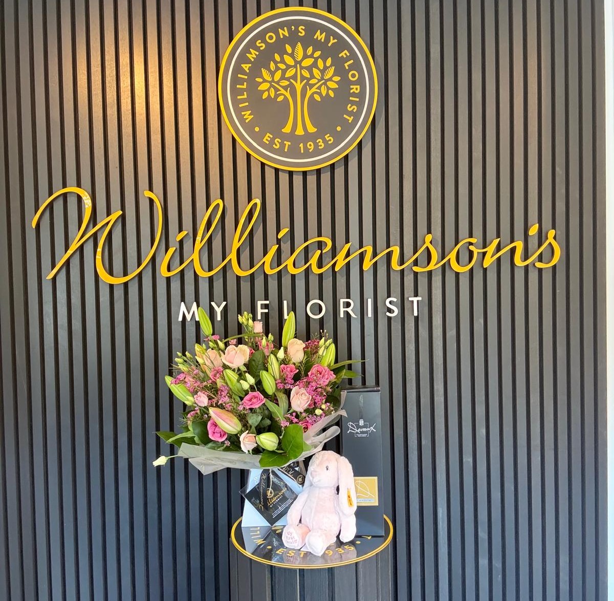 Luxury new baby gift with pink rose and lily bouquet, Devaux Champagne and Steiff Hoppie Rabbit Luxury new baby gift with pink rose and lily bouquet, Devaux Champagne and Steiff Hoppie Rabbit