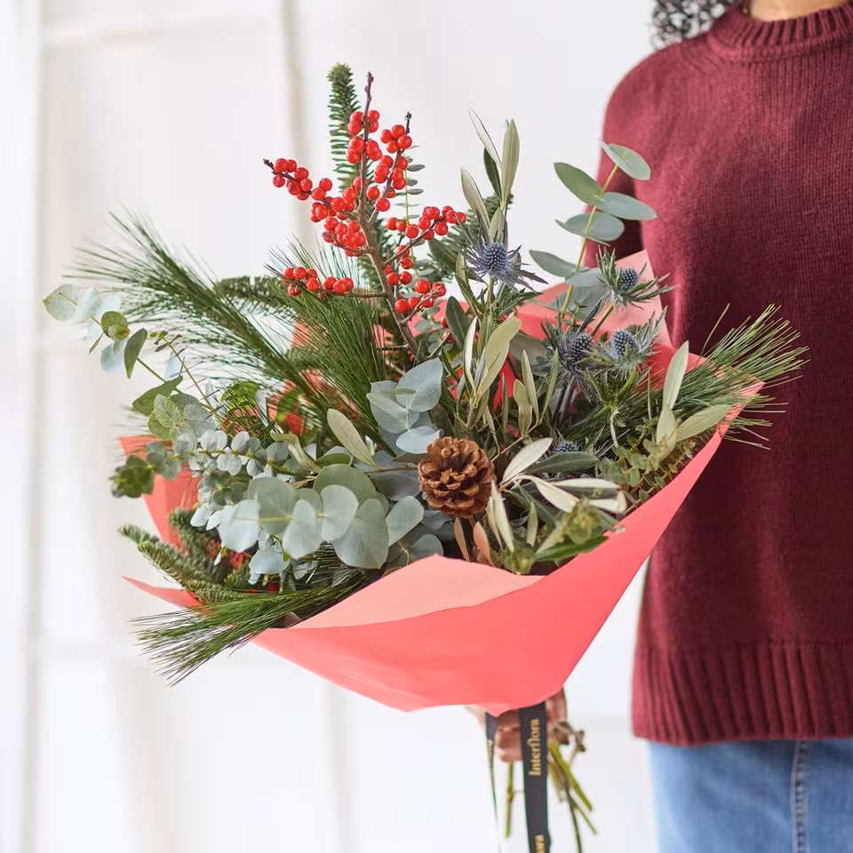 Festive Foliage Bouquet – Williamson’s Myflorist Festive Foliage bouquet with winter greenery, red berries and natural cones